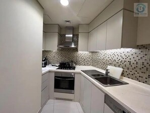 Private kitchen - Great Views / Perfect 1BR Apartment/  The Vogue Dubai/ Blueoceanholidayhomes (Business Bay)