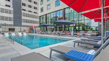 Outdoor pool, open 7:00 AM to 10:00 PM, pool cabanas (surcharge)