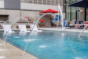 Outdoor pool, open 7:00 AM to 10:00 PM, pool cabanas (surcharge)