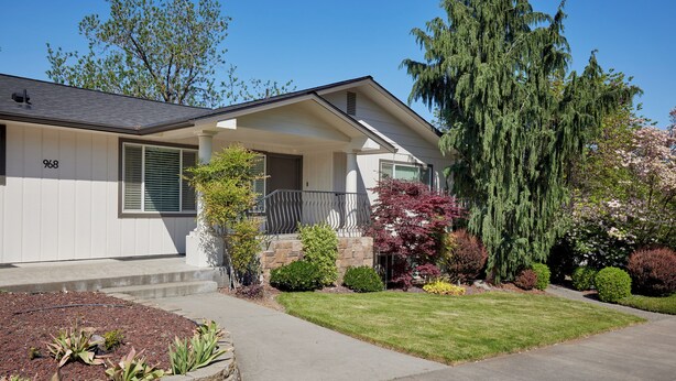 A single-story house with a front porch, a stone foundation, and a well-maintained lawn. - ESCAPE TO WALLA WALLA WINE COUNTRY — YOUR PRIVATE KING SUITE ACROSS FROM TH... (College Place)