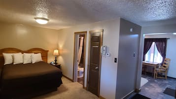 Executive Suite | 1 bedroom, desk, free WiFi, bed sheets