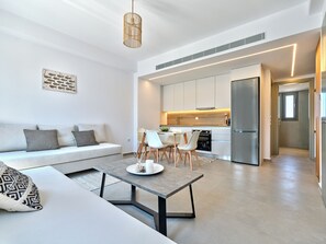 Deluxe Apartment | Living area | 43-inch Smart TV with digital channels - Paros Gem (Paros)