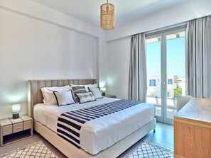 ดีลักซ์อพาร์ทเมนท์ | ตู้นิรภัยในห้องพัก, เตารีด/โต๊ะรีดผ้า, Wi-Fi ฟรี, ผ้าปูที่นอน