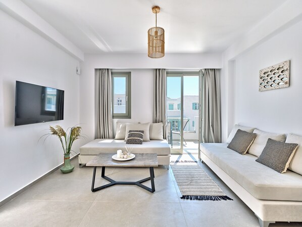 Deluxe Apartment | Living area | 43-inch Smart TV with digital channels - Paros Gem (Paros)