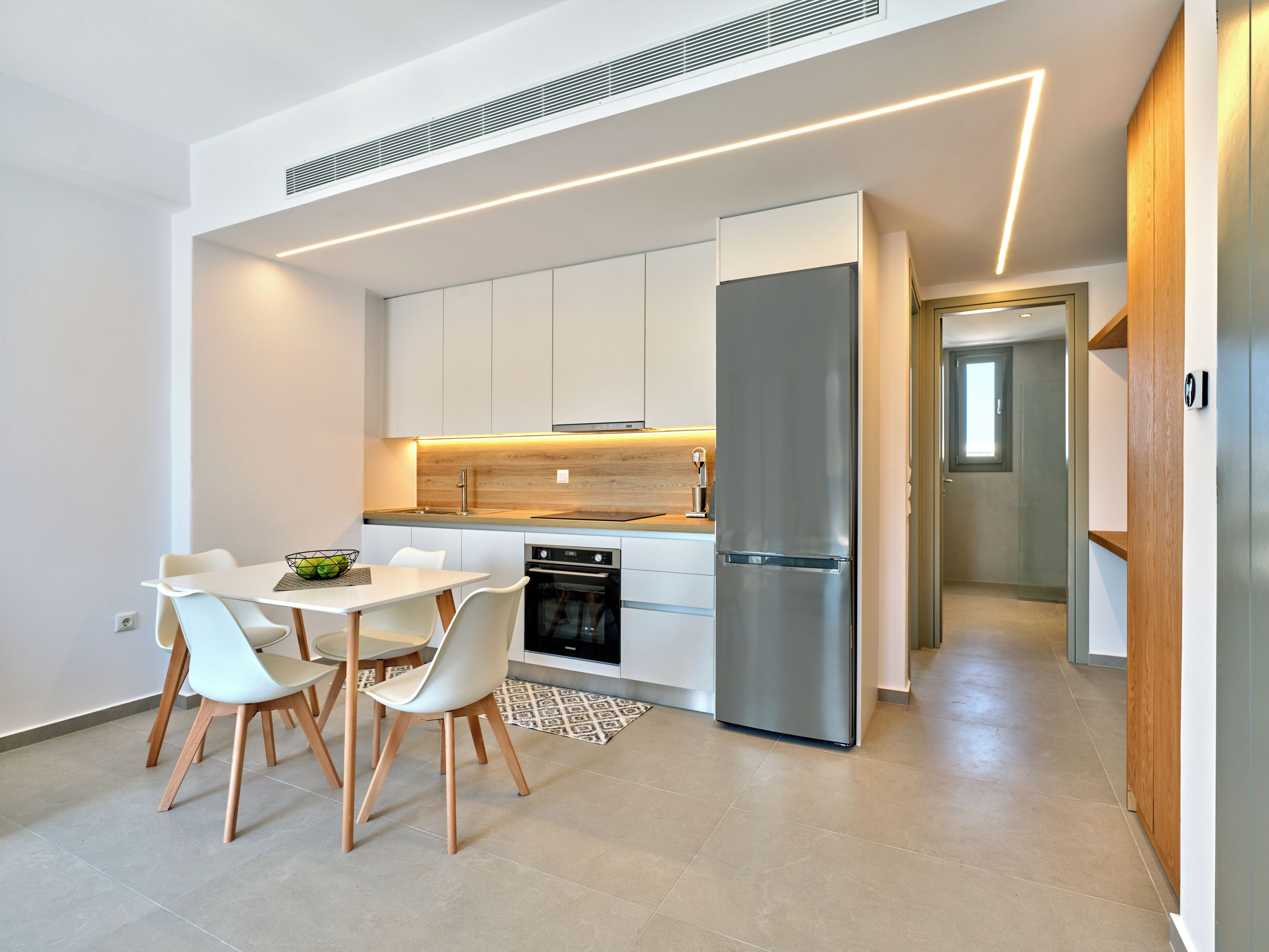 Deluxe Apartment | Private kitchen | Full-sized fridge, oven, stovetop, electric kettle