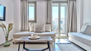 Deluxe Apartment | Living area | 43-inch Smart TV with digital channels