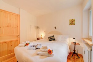 Family Apartment, Multiple Bedrooms (Appartamento La Marmotta Mountain) | 2 bedrooms, free WiFi, bed sheets