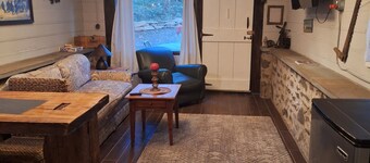 Cozy tiny log cabin on 14 acres