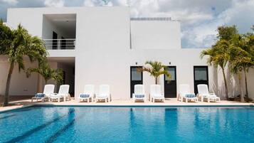 Outdoor pool, open 8:00 AM to 10:00 PM, free pool cabanas