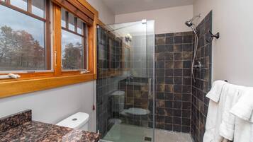Bathtub, hair dryer, towels, soap