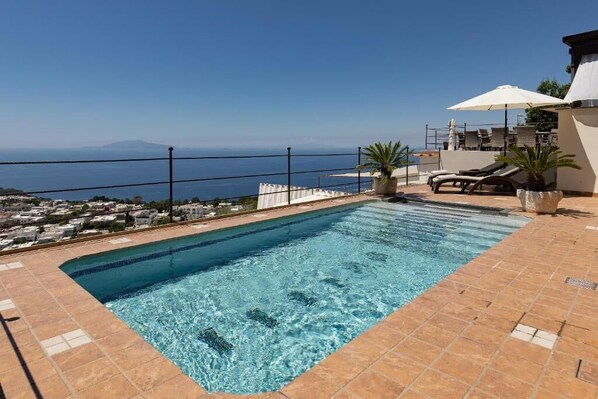 Seasonal outdoor pool, open 11:00 AM to 9:00 PM, sun loungers