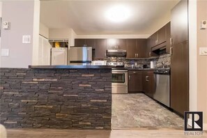 Private kitchen - Modern 2 bed/2 bath Condo in Great location
(Winnipeg)