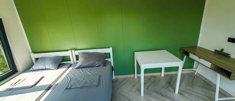 1 dormitori i roba de llit