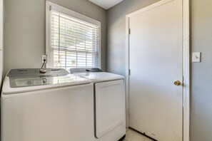 Convenient laundry facilities with a washer and dryer.
