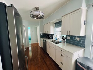 Fridge, microwave, dishwasher, coffee/tea maker