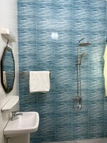 Shower, hydromassage showerhead, towels
