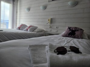 Panoramic Quadruple Room | Individually furnished, desk, free WiFi, bed sheets