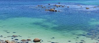 The apartment is located in front of Langosteira beach, with stunning views.