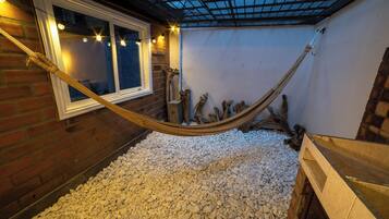 Departamento exclusivo, 1 cama Queen size | Terraza o patio