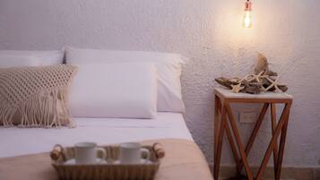 Habitación exclusiva, 1 habitación | Ropa de cama de alta calidad, edredón y minibar