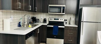 Peaceful and Spacious Family-friendly Basement Suite Next to Fish Creek Park