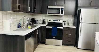 Peaceful and Spacious Family-friendly Basement Suite Next to Fish Creek Park