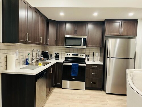 Peaceful and Spacious Family-friendly Basement Suite Next to Fish Creek Park