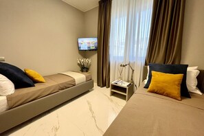 2 slaapkamers, een strijkplank/strijkijzer, wifi, beddengoed