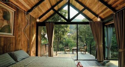 Wilderness Treehouse Above a Stunning Waterfall