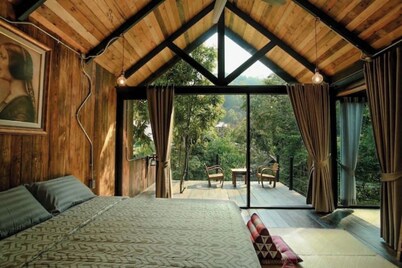 Wilderness Treehouse Above a Stunning Waterfall