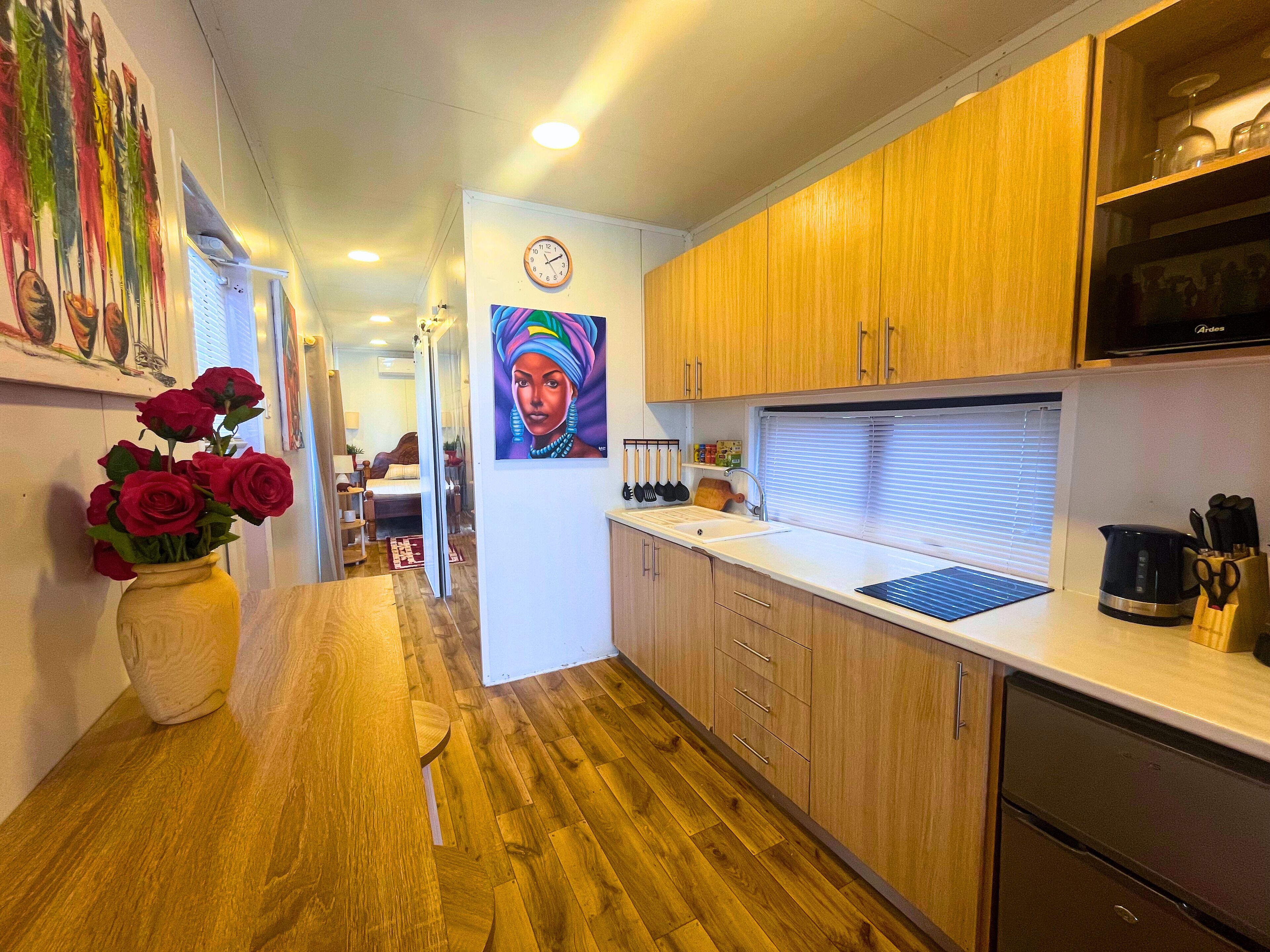 Mini-fridge, microwave, stovetop, coffee/tea maker