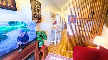 40-inch flat-screen TV with digital channels, fireplace, Netflix