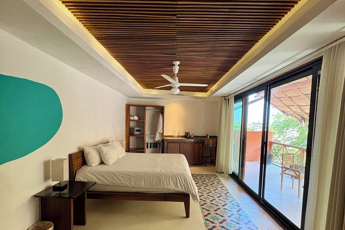 Suíte estúdio superior | Wi-Fi de cortesia, roupa de cama