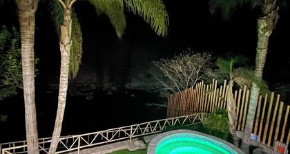 Riverfront house with private pool and garden
