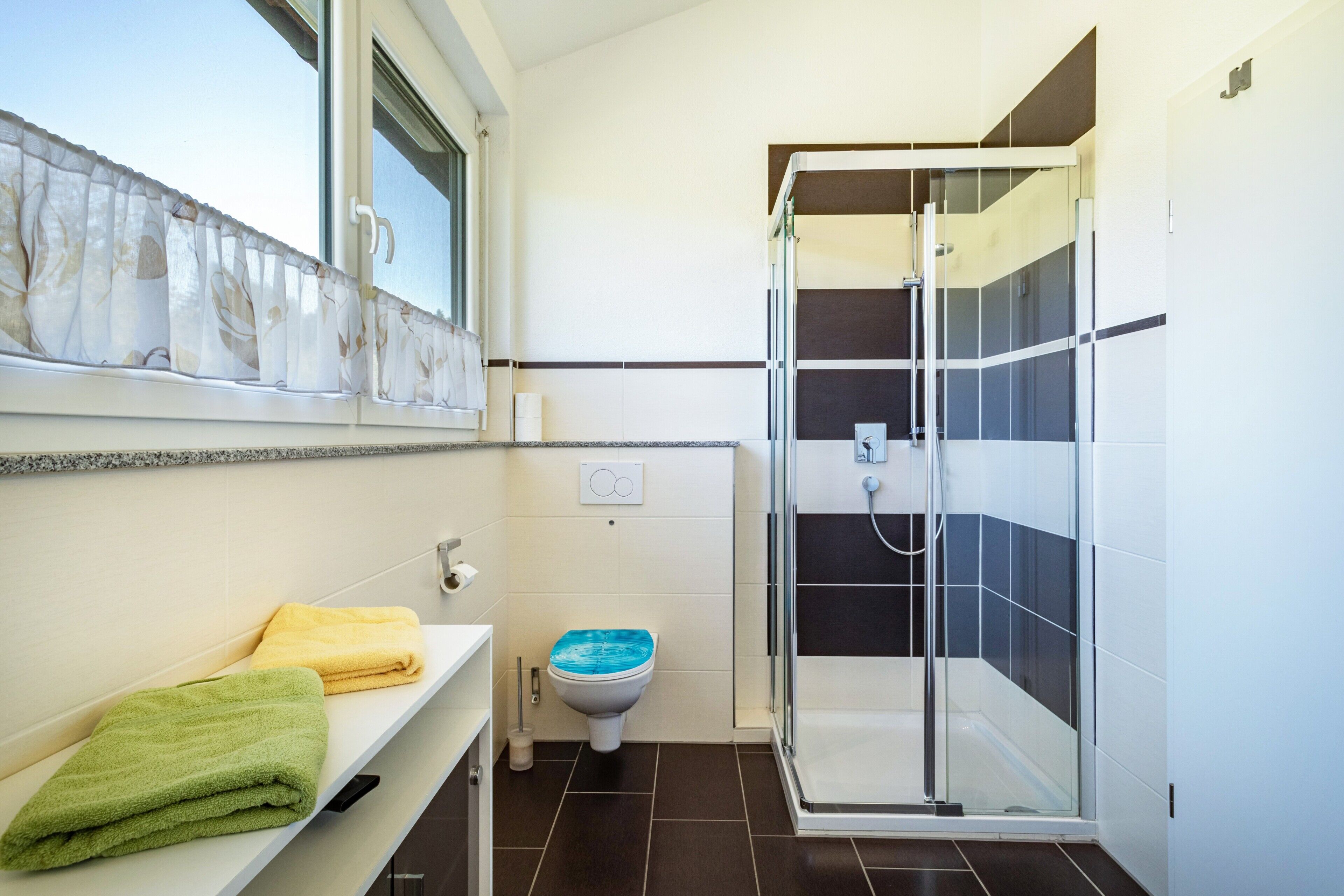 Bathtub, hair dryer, towels