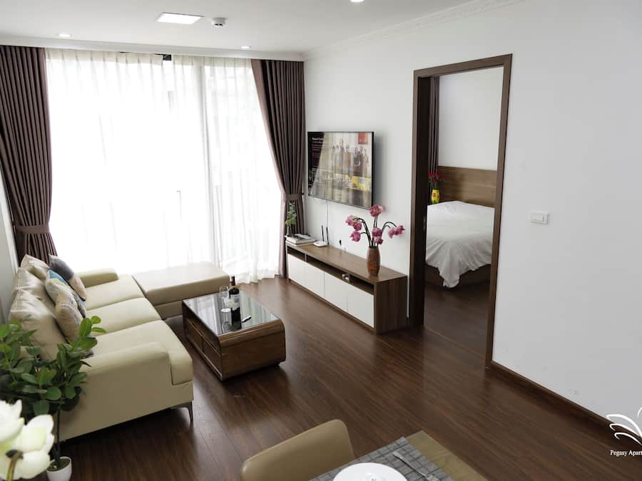 Family Twin Room, 2 Bedrooms, City View | Living area | Smart TV, fireplace