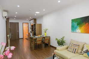 A modern apartment with a dining area, kitchen, and living room. - Pegasy Apartments & Travel (Hanoi)