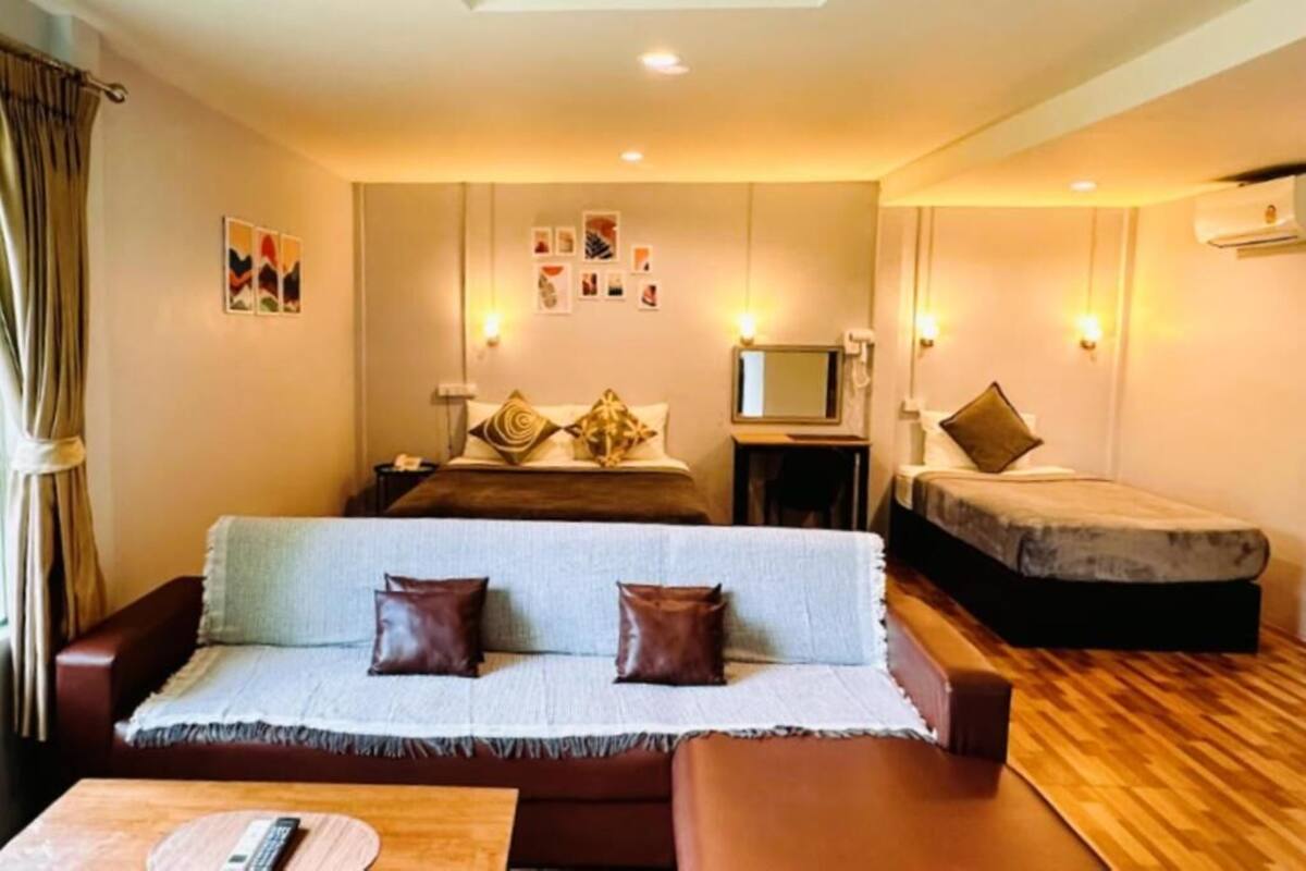 Deluxe Triple Room | Minibar (free items), desk, WiFi (free), individually decorated
