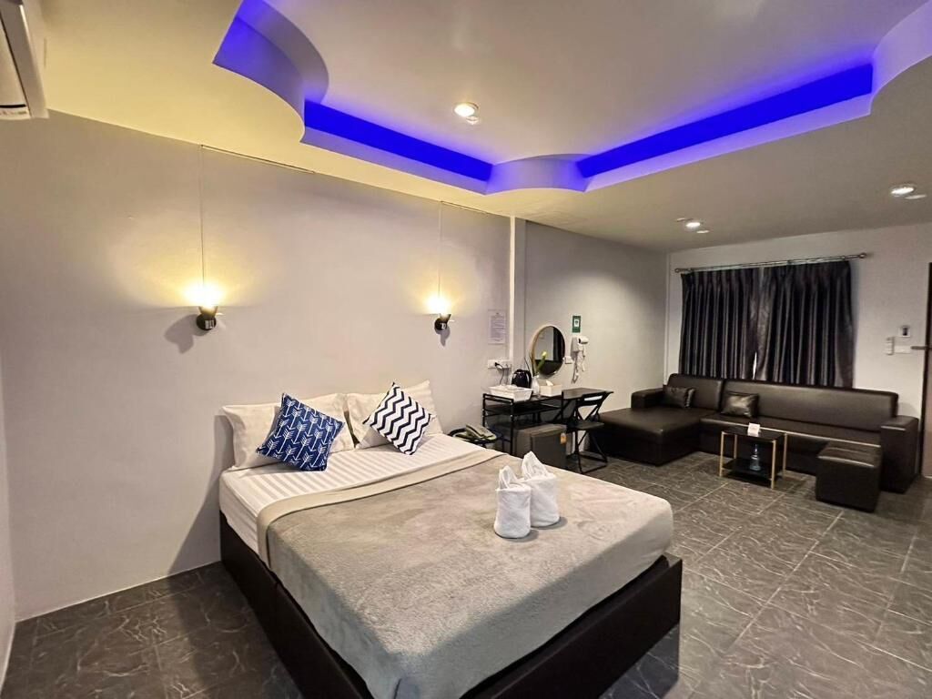 Chambre Double Deluxe | Articles gratuits dans le mini-bar, décoration personnalisée, bureau