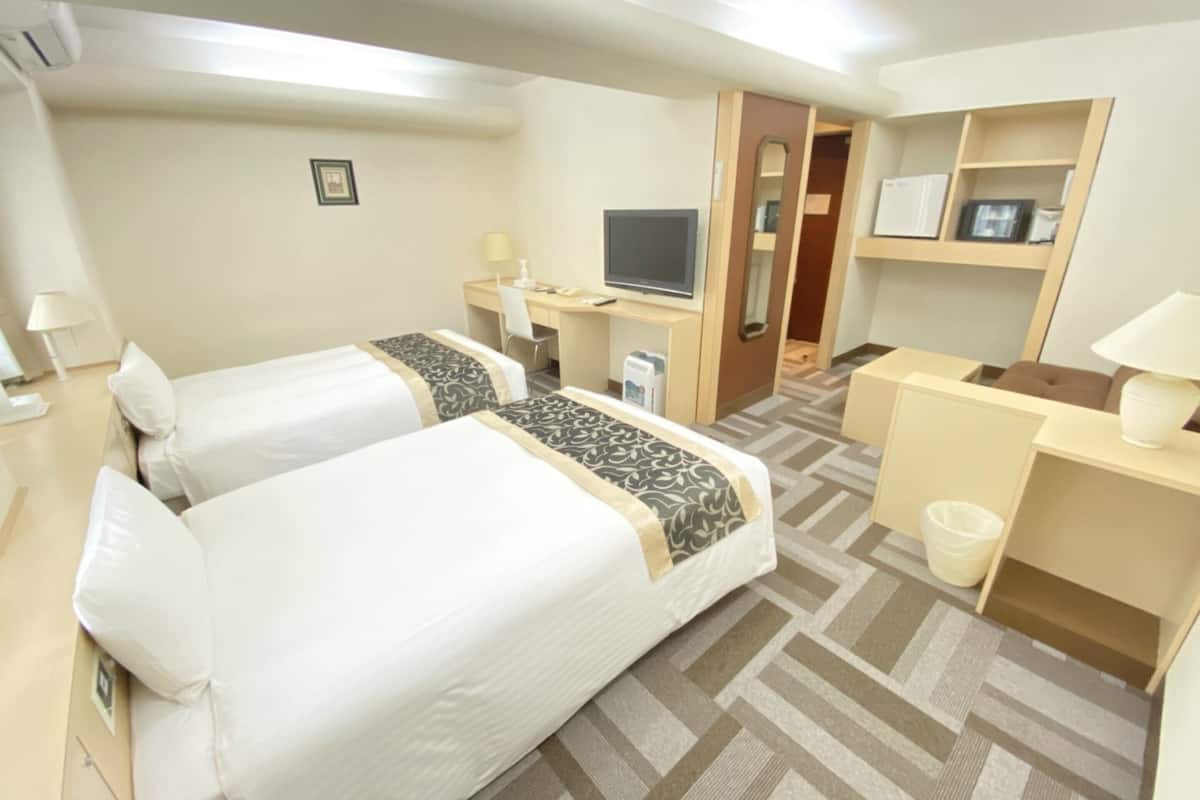 Deluxe Twin kamer | Een bureau, gratis wifi, beddengoed