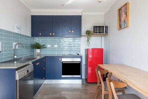 Fridge, microwave, stovetop, cookware/dishes/utensils