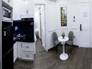 Apartment, 1 Bedroom | Living area | Flat-screen TV