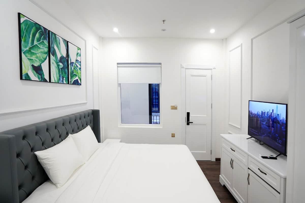 Habitación Deluxe doble, 1 cama de matrimonio grande, no fumadores | 1 dormitorio, minibar, sistema de insonorización y wifi gratis