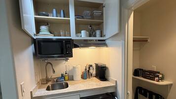 Fridge, microwave, coffee/tea maker, toaster