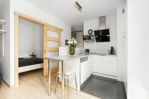 Apartment, 1 Bedroom, Kitchen | Private kitchen | Microwave, dishwasher, cookware/dishes/utensils - Cozy Poznan Apartment by Renters (Poznan)