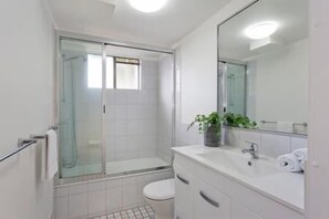 Shower, towels, soap, shampoo