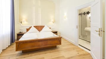 1 habitación, sistema de insonorización y tabla de planchar con plancha