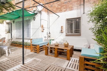 Outdoor dining. Holiday Home 'Cal Marcos' with Private Terrace, Private Garden and Wi-Fi
