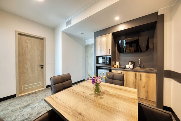 Senior Triple Room, 2 Bedrooms | Desk, laptop workspace, bed sheets