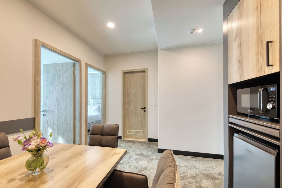 senior triple room, 2 bedrooms | 1 bedroom, desk, laptop workspace, bed sheets